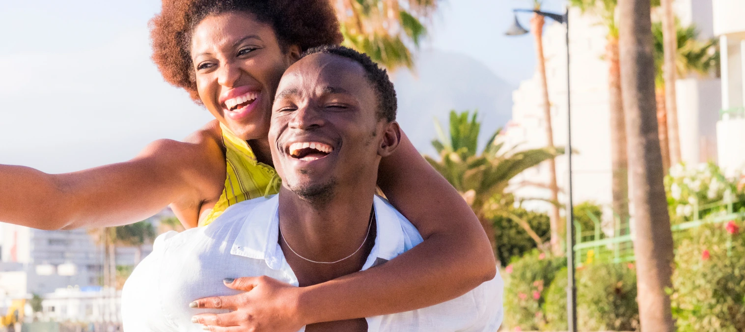 a happy couple vacationing on a beach resort